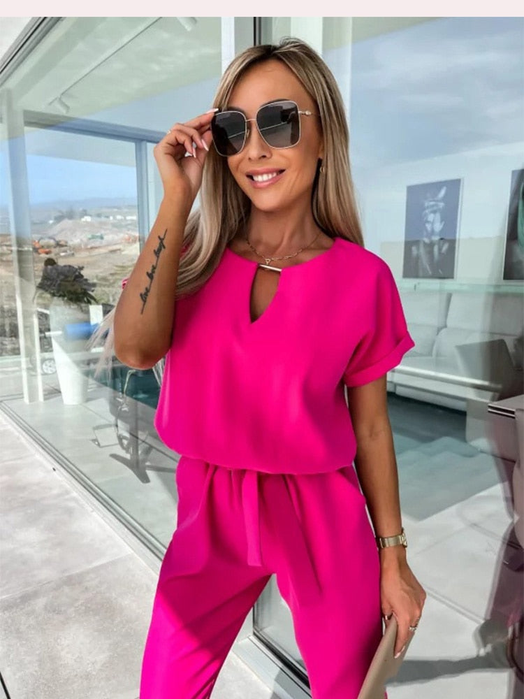 set voor dames โ Monique | Jumpsuit Met Korte Mouwen En Ceintuur
