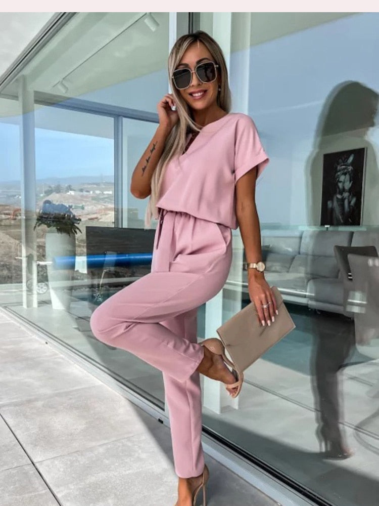 set voor dames โ Monique | Jumpsuit Met Korte Mouwen En Ceintuur