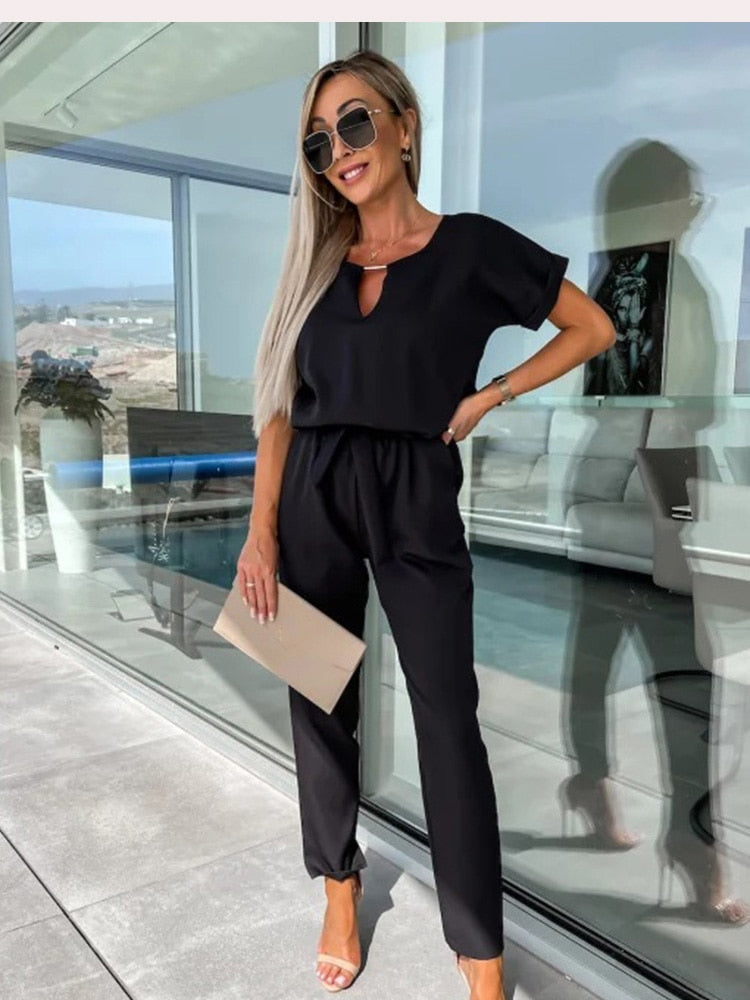set voor dames โ Monique | Jumpsuit Met Korte Mouwen En Ceintuur
