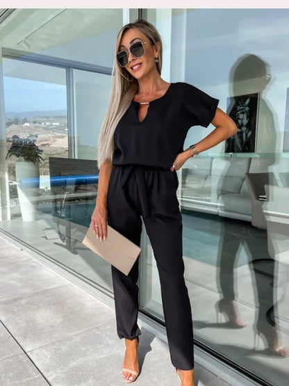 set voor dames – Monique | Jumpsuit Met Korte Mouwen En Ceintuur